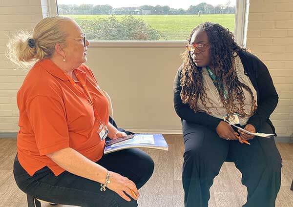 Alison Keiser Nurse Consultant talking to Beehive Care team member